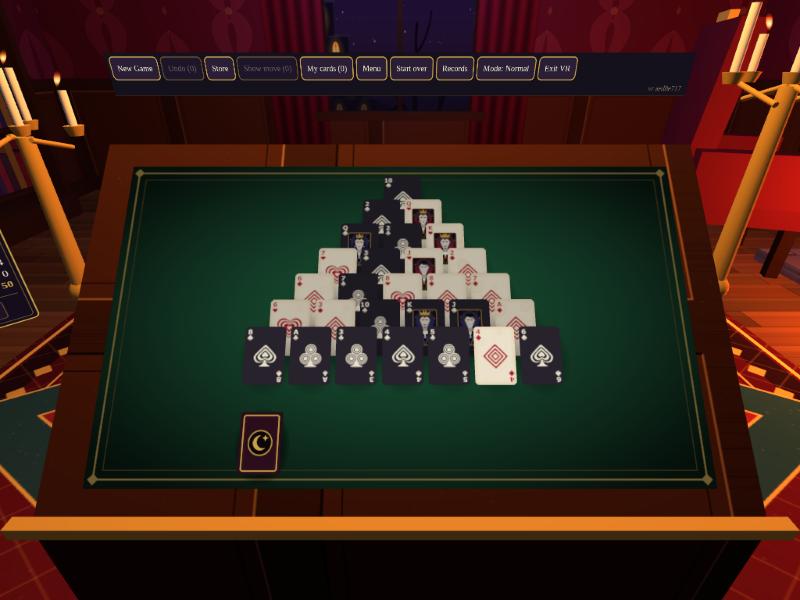 The Tiepair table in VR: the pyramid of cards on a green felt board, on a wooden slope-top table in a gothic parlour, with the toolbar floating above it and candelabras either side.